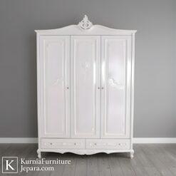 Lemari pakaian mewah modern warna putih dengan desain elegan dan ukiran halus