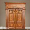 Kusen pintu jati ukir klasik dengan desain megah dan detail ukiran artistik untuk pintu utama rumah
