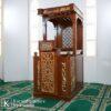 Majestic Serenity Mimbar Kayu Jati Ukiran Kaligrafi Elegan untuk Masjid & Musholla 1 mimbar kayu jati ukiran kaligrafi elegan untuk masjid